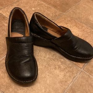 Born black leather clogs